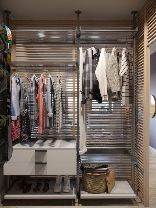 Система хранения одежды в гардеробе. Задняя решетчатая стенка пропускает много света