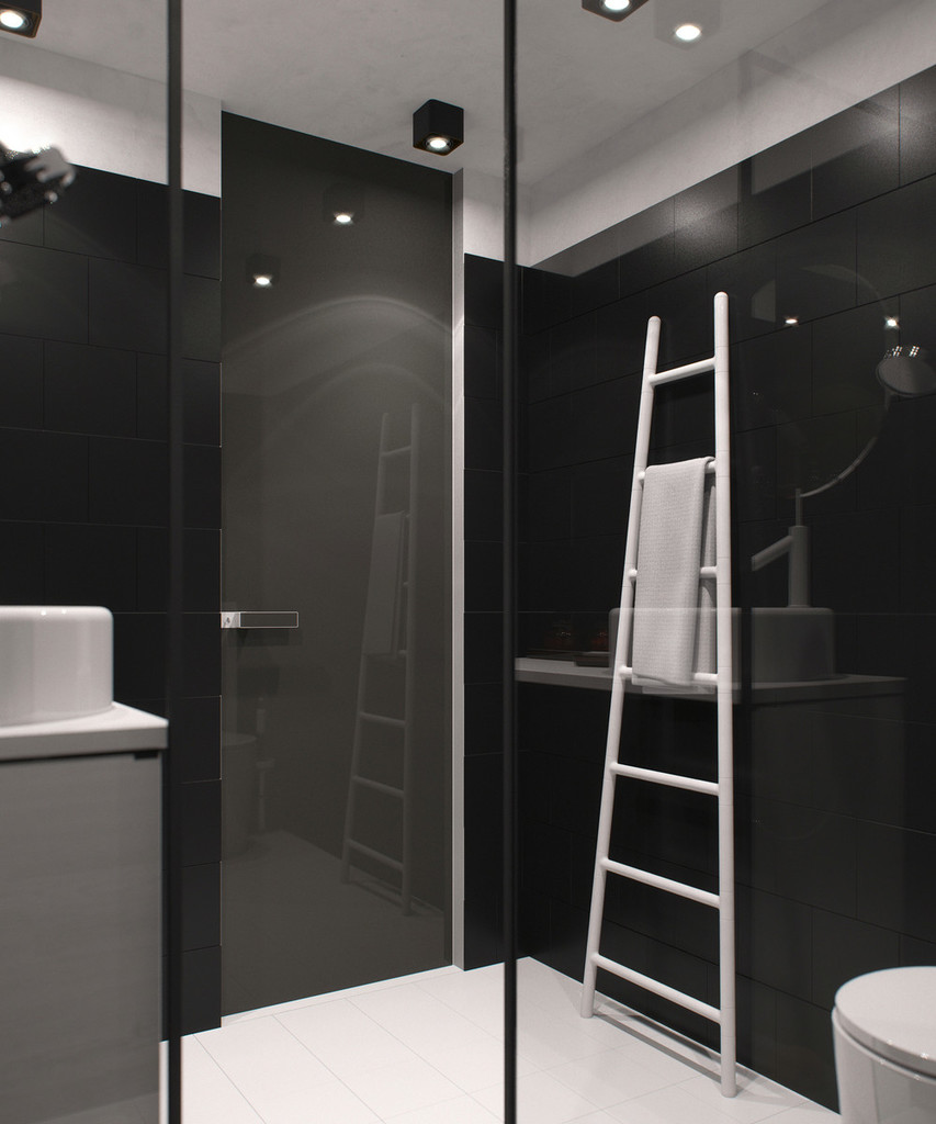 Ванна выполнена в стиле минимализм и тех же черно-белых цветках, что и вся квартира.