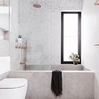 Довольно часто в современных ванных комнатах можно встретить бетонную ванну.