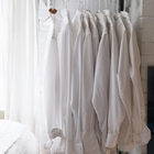 Вешалками для одежды заняты свободные ниши с обоих сторон спальни.